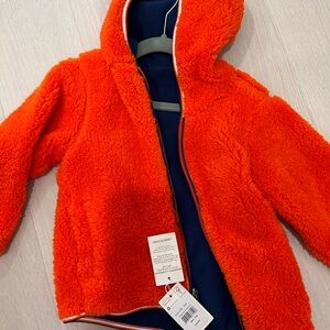Boden new with tags reversible fleece jacket; navy blue and red fleece